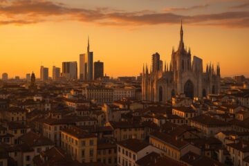 Vista panoramica di Milano dai tetti con il Duomo e i grattacieli al tramonto